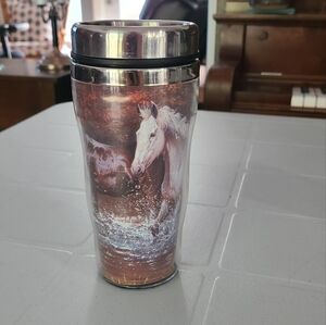 A travel coffee mug. In good condition.